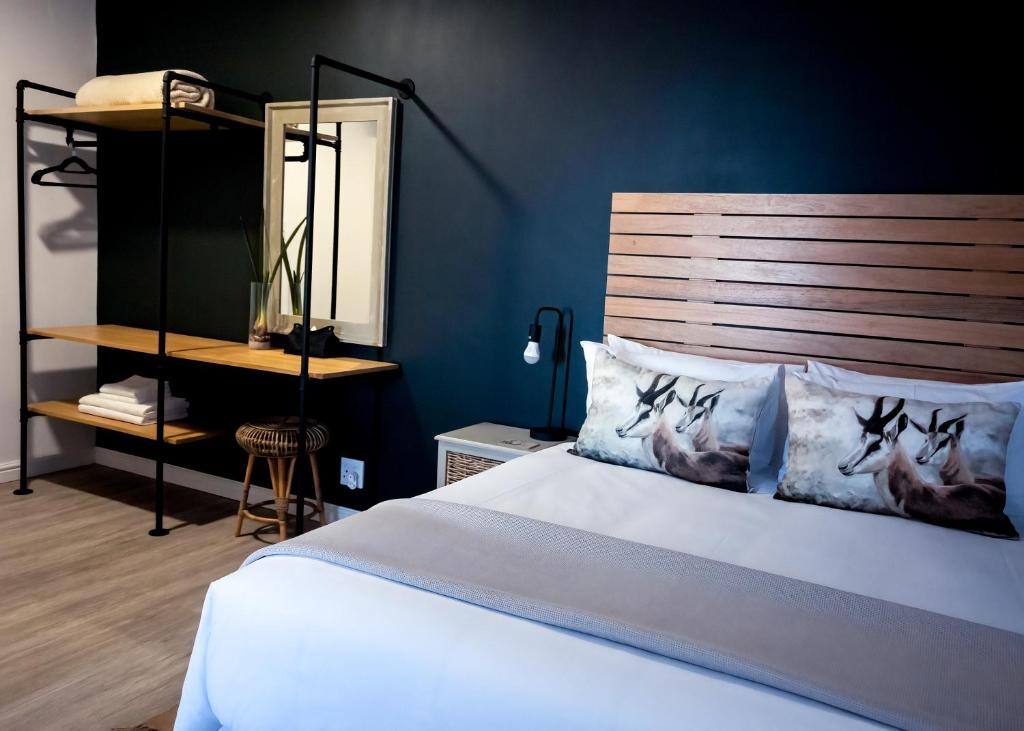 Bedroom with queen bed at Steenbok Self-Catering